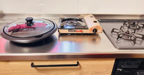 Η κουζίνα ή μικρή κουζίνα στο inn 1st