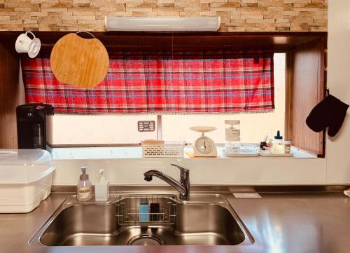 Η κουζίνα ή μικρή κουζίνα στο inn 1st