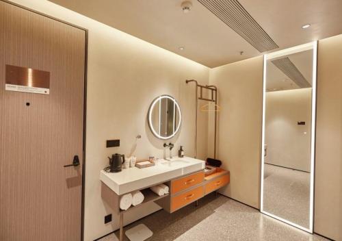 Ένα μπάνιο στο 安渡酒店-苏州观前街七里山塘店