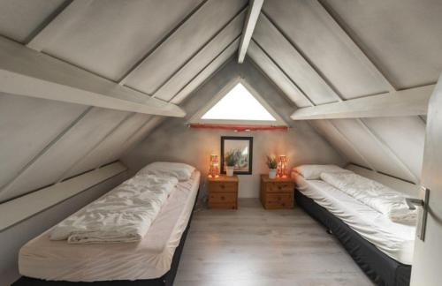 Ένα ή περισσότερα κρεβάτια σε δωμάτιο στο Bungalowpark Simpelveld - Delta 132