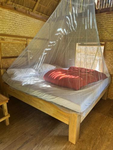 Postel nebo postele na pokoji v ubytování Petros Bungalows