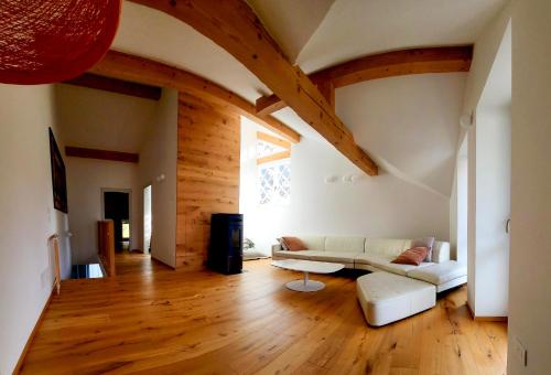 a living room with a couch and a table at Casa Diletta in Prade