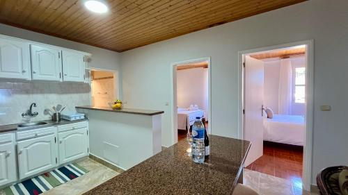 Kuchyň nebo kuchyňský kout v ubytování Domingos Reis