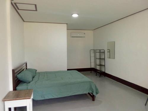 Postel nebo postele na pokoji v ubytování Koh Kho Khao Guest House