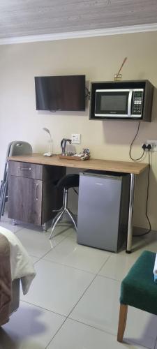 Η κουζίνα ή μικρή κουζίνα στο Masane Lodge