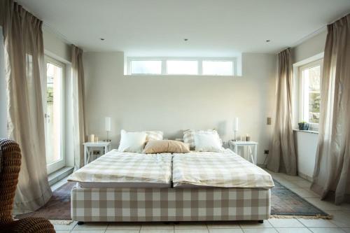 En eller flere senge i et værelse på Bei Bo in Rösrath