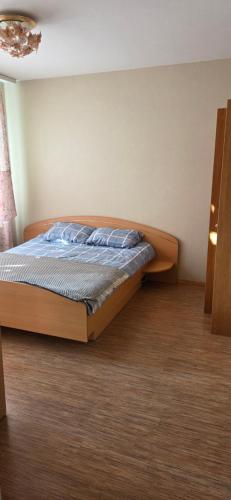 Ένα ή περισσότερα κρεβάτια σε δωμάτιο στο Flat