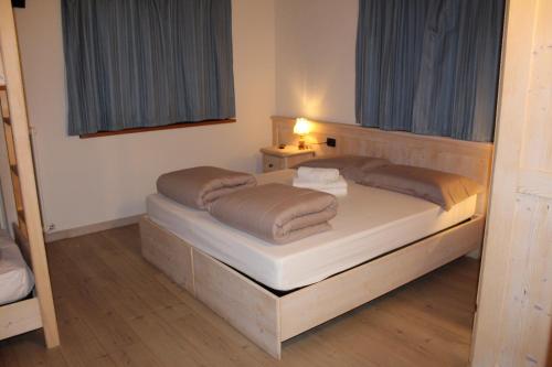 Ένα ή περισσότερα κρεβάτια σε δωμάτιο στο Agriturismo Quinto Quarto