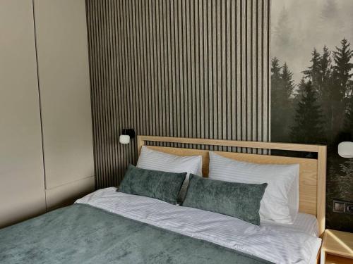 Ένα ή περισσότερα κρεβάτια σε δωμάτιο στο Апарт-готель "Модерн 24"