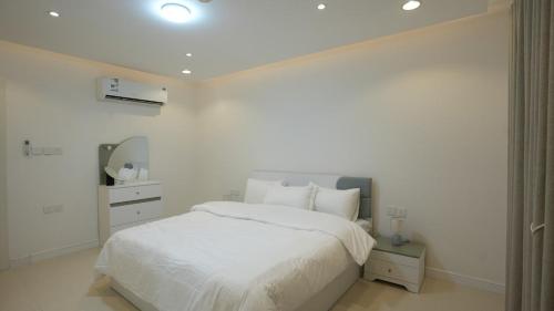 Ένα ή περισσότερα κρεβάτια σε δωμάτιο στο MK Luxury Apartment