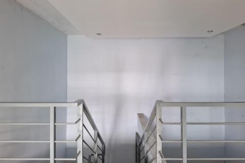 Postel nebo postele na pokoji v ubytování Griya Kencana Asri Syariah near RS Karima Utama Kartasura RedPartner