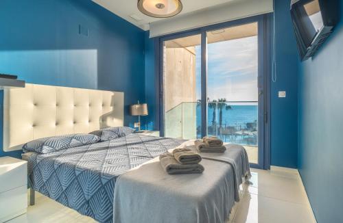 Postel nebo postele na pokoji v ubytování Sea Breeze Apartment