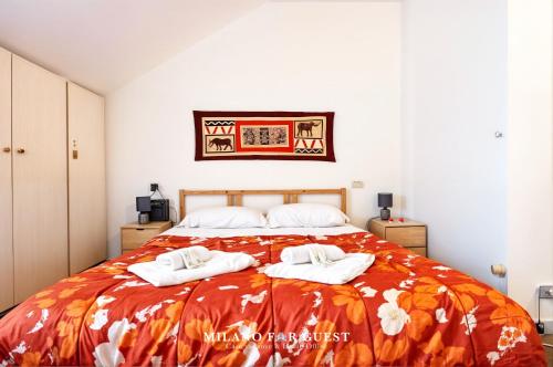 Postel nebo postele na pokoji v ubytování MILANO FOR GUEST- Duomo Apartment