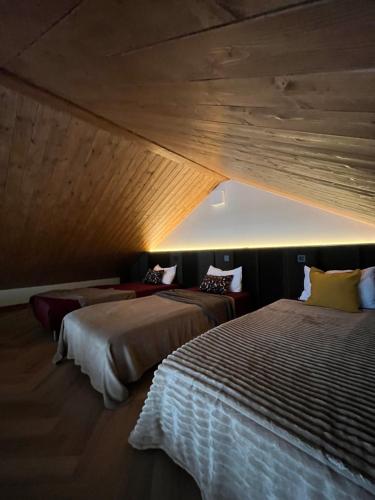 Ένα ή περισσότερα κρεβάτια σε δωμάτιο στο MöK Puhkemajad