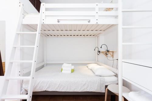 Postel nebo postele na pokoji v ubytování Tabaiba Guesthouse