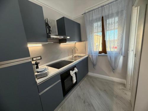 Η κουζίνα ή μικρή κουζίνα στο Appartamento in città immerso nel verde