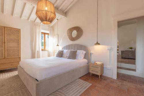 Postel nebo postele na pokoji v ubytování Casa Del Pozzo