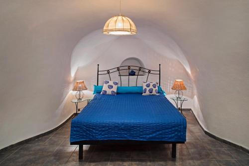 Postel nebo postele na pokoji v ubytování CASA SOFIA-Volcano View