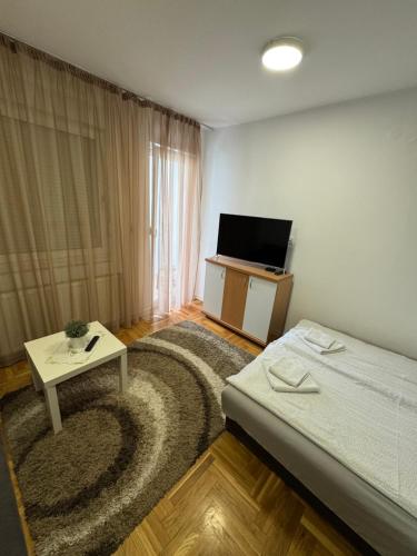 Postelja oz. postelje v sobi nastanitve Kruna apartment