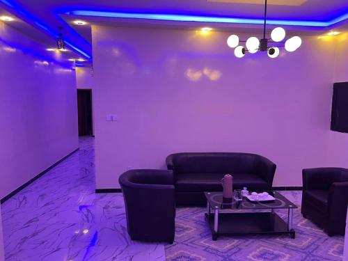 Posezení v ubytování Appartement meublé, confortable et abordable à Saint-Louis