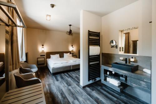 Postel nebo postele na pokoji v ubytování StrandBerg's B&B Oma Ida