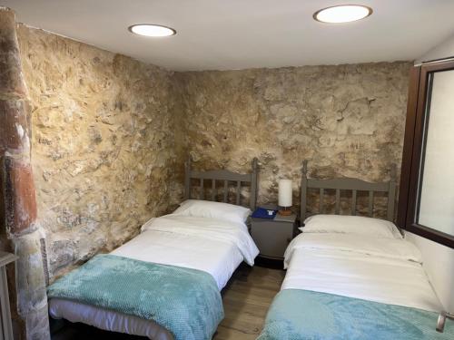 Postel nebo postele na pokoji v ubytování LA CASA BLANCA, Padilla de Hita