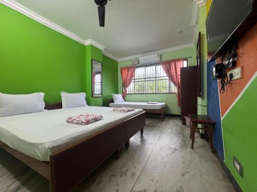 Ένα ή περισσότερα κρεβάτια σε δωμάτιο στο GM Residency