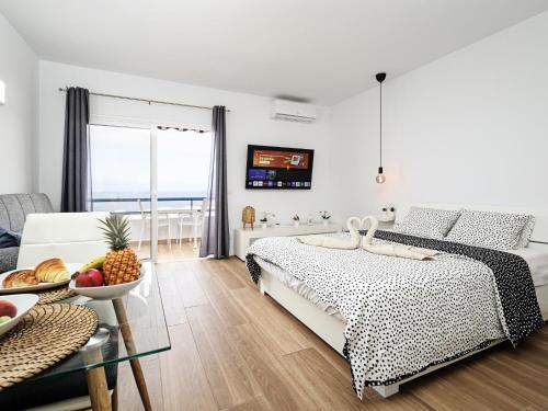 Ένα ή περισσότερα κρεβάτια σε δωμάτιο στο Sweet Escape