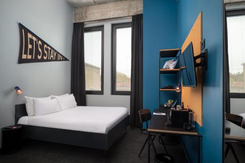 Postel nebo postele na pokoji v ubytování The Social Hub Bologna