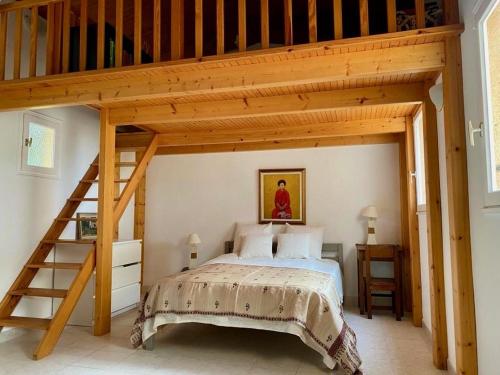 Ένα ή περισσότερα κρεβάτια σε δωμάτιο στο Villa 13 oliviers Couchers de soleil LUMIO