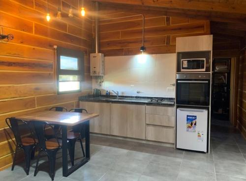 Cuisine ou kitchenette dans l'établissement San Yucac Relax