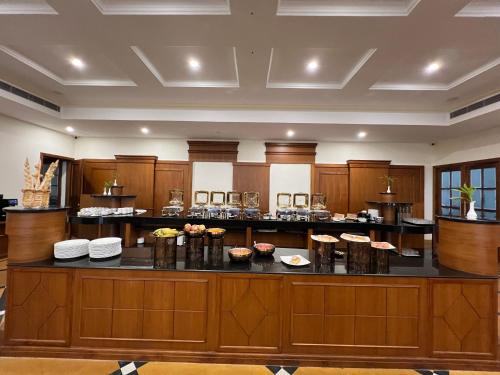 Khu vực lounge/bar tại ROYALE de' CASA RESORT KAZIRANGA