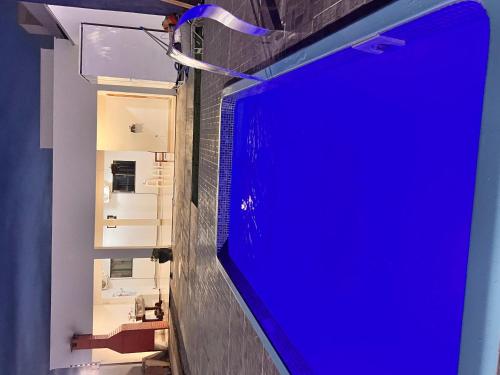 TV a/nebo společenská místnost v ubytování Casa para locação de temporada em Sinop