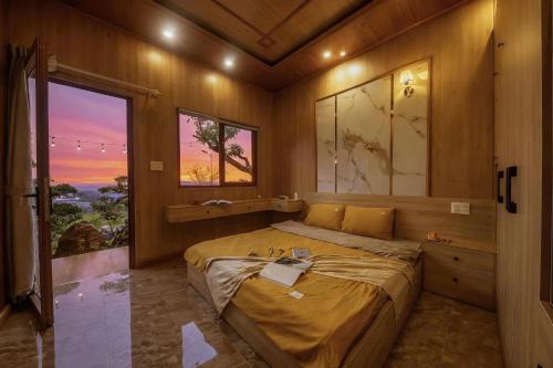 Postel nebo postele na pokoji v ubytování Vườn Mây - Cloud Garden - ngắm mây và hoàng hôn tại chỗ cực chill