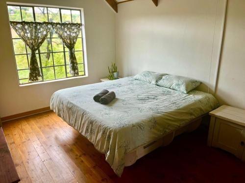 Ένα ή περισσότερα κρεβάτια σε δωμάτιο στο Vellies Getaway