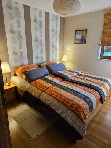 Postel nebo postele na pokoji v ubytování Ferienwohnung Peetsch am See