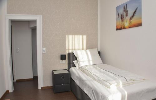 Postel nebo postele na pokoji v ubytování Vittoria Hotel-Restaurant