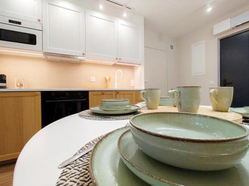 a kitchen with a bowl on a table at Na Pokładzie e-apart in Jastrzębia Góra