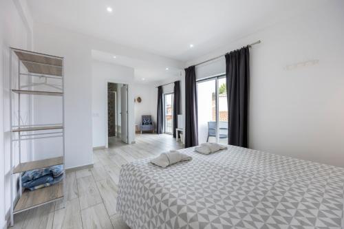 En eller flere senge i et værelse på 3 Marias Guest House B&B