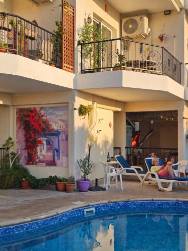 Bazén v ubytování Peyia Sunset nebo v jeho okolí