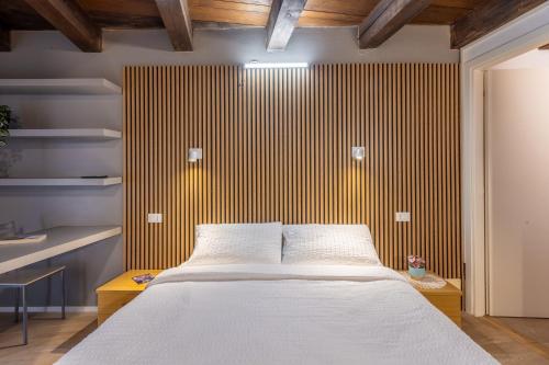 Postel nebo postele na pokoji v ubytování Le Meridiane City Rooms In Trento