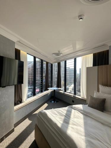 Ένα ή περισσότερα κρεβάτια σε δωμάτιο στο Nord Gate Avenue Hotel