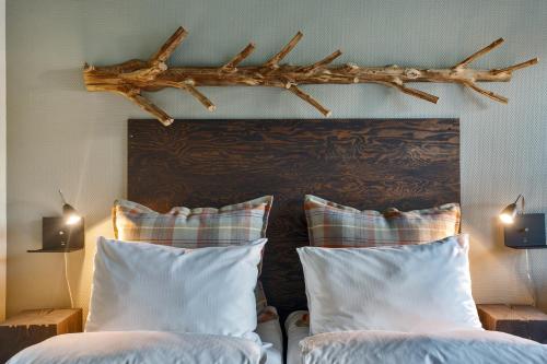 Ένα ή περισσότερα κρεβάτια σε δωμάτιο στο Trysil Hotel