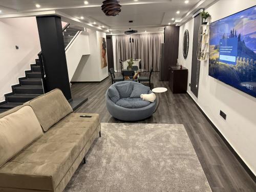 Un lugar para sentarse en Villalori Apartments