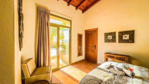 Postel nebo postele na pokoji v ubytování Finca Estrelicia