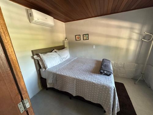 Postel nebo postele na pokoji v ubytování Recanto Pé na Areia SC