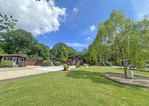 Κήπος έξω από το Heronstone Lodges