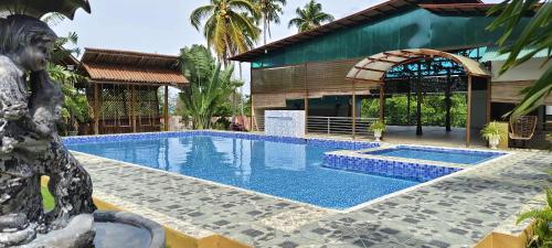 Bazén v ubytování Elena Guest House & Resort nebo v jeho okolí