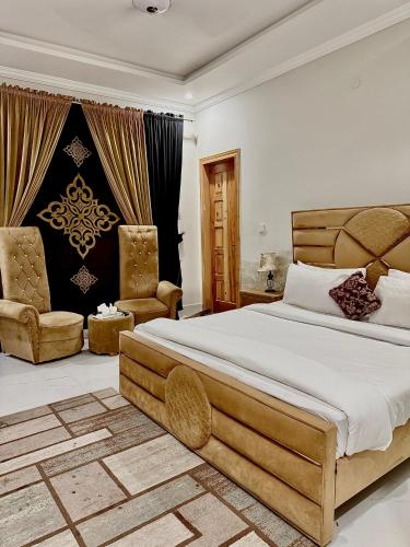 Ένα ή περισσότερα κρεβάτια σε δωμάτιο στο Paradise Guest House Islamabad