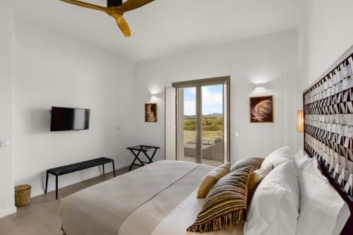 Postel nebo postele na pokoji v ubytování Lyra House Antiparos